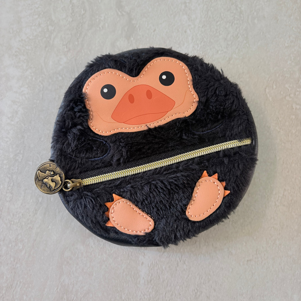 Peluche monedero escarbato