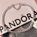 P04 Brazalete estilo Pandora incluye caja. Material: Baño de plata.
