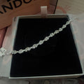 P61 Brazalete moño Incluye caja. Material: Baño de plata.