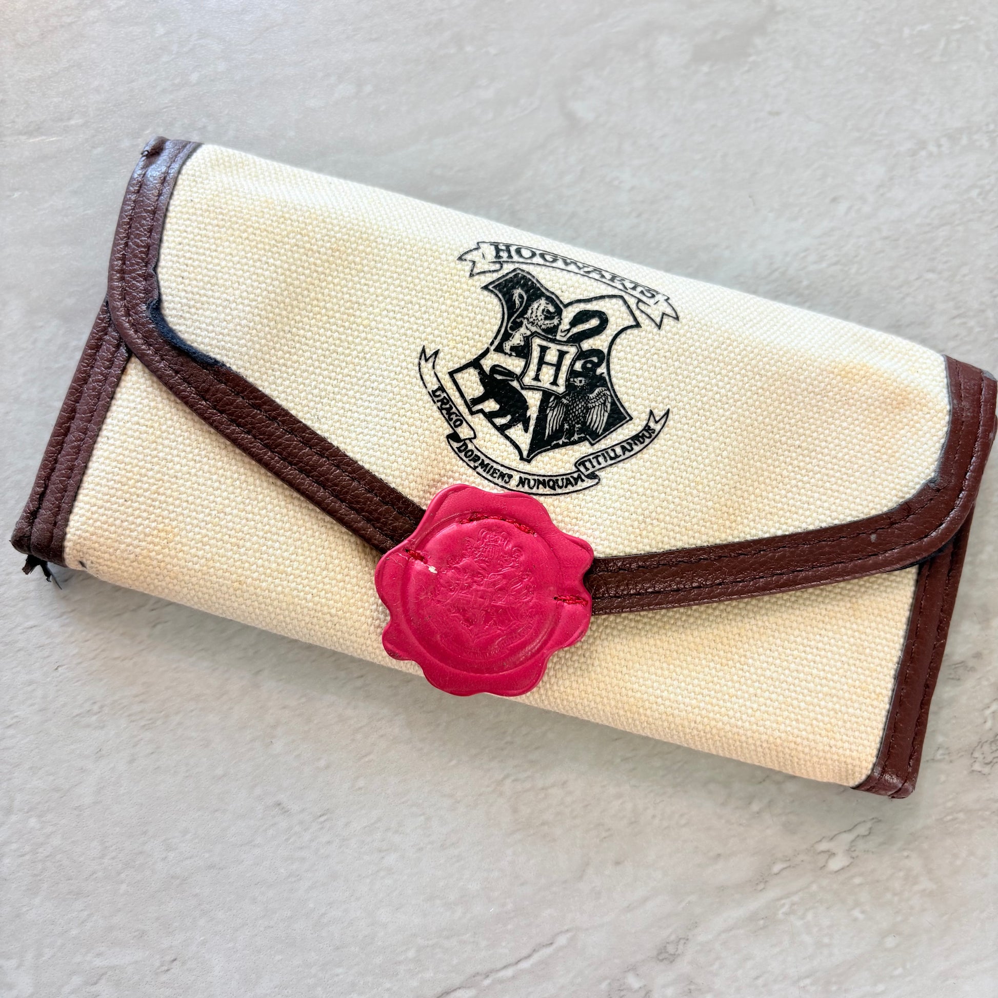Cartera HP Escudo y sello