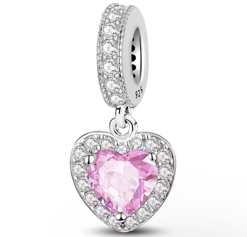 CHP085 - Charm colgante corazón piedra con relieve.