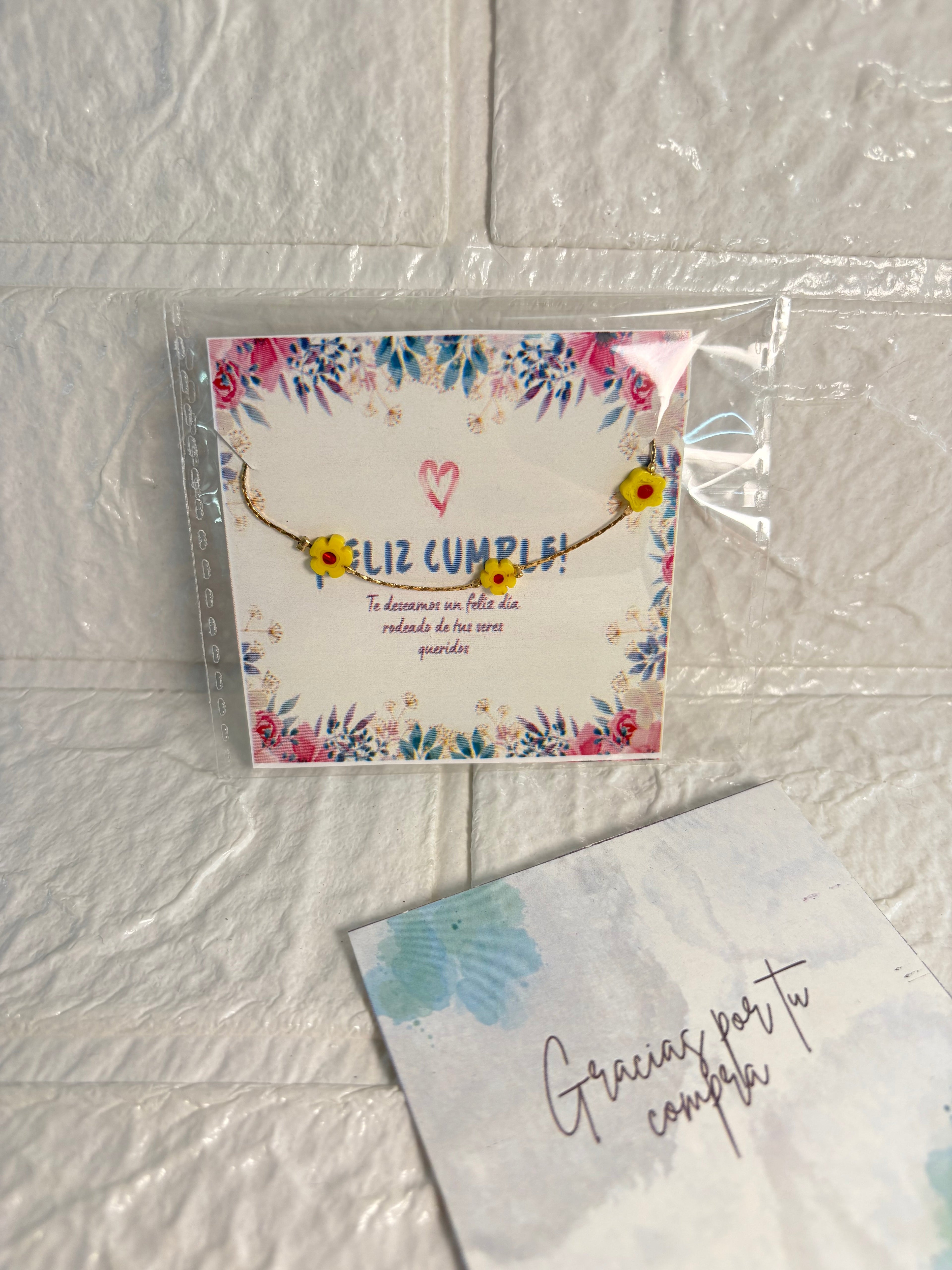 Pulsera flor en oro laminado