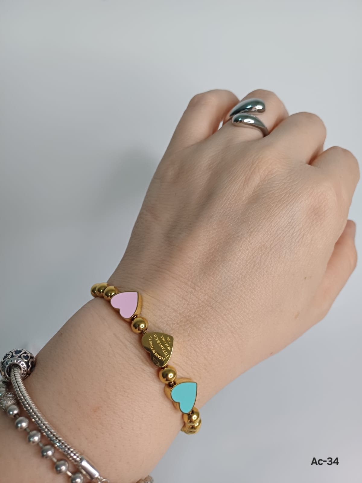 Ac-34 Pulso en acero inoxidable.