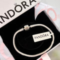 P16 Brazalete estilo Pandora incluye caja. Material: Baño de plata.