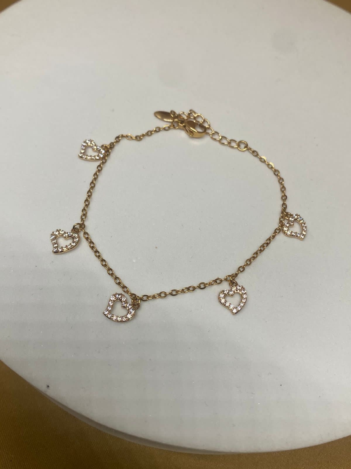 P26219 Pulsera con piedra corazón  Material: Oro Laminado 18k.